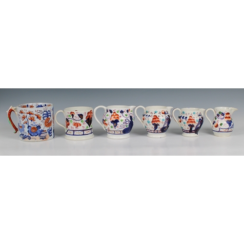 394 - Four gaudy decorated jugs and two tankards one tankard marked Mason's Ironstone, tallest 4½in. (11.4... 