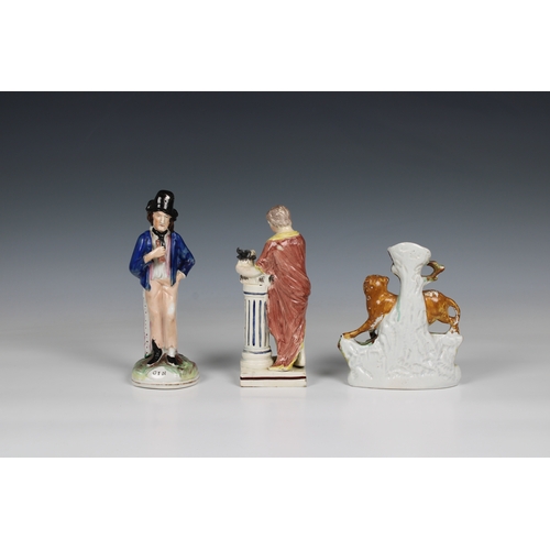 397 - Three 19th century Staffordshire pottery figures to include a back to front figure of a gentleman 'G... 