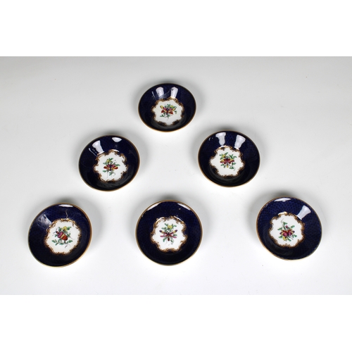 400 - A set of six Royal Worcester blue fish scale coffee cans with matching saucers, each with a central ... 