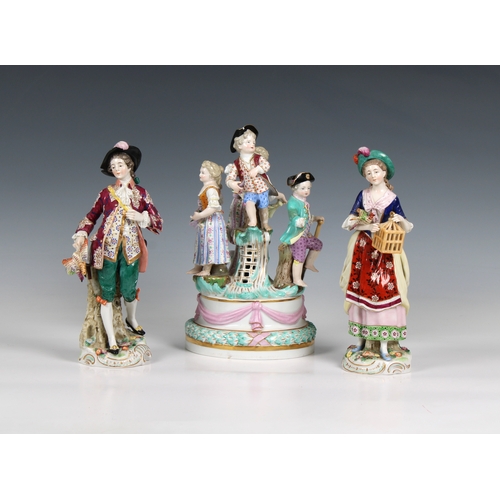 404 - A pair of Continental porcelain figures of a man carrying a bird and a woman carrying a bird cage, g... 