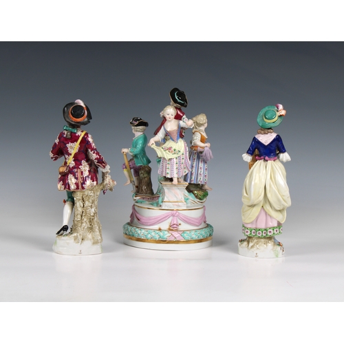 404 - A pair of Continental porcelain figures of a man carrying a bird and a woman carrying a bird cage, g... 