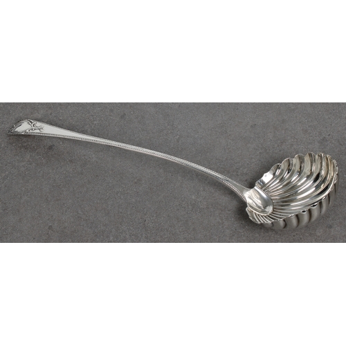 475 - A George III silver Old English pattern ladle Walter Tweedie, London, 1774, scallop shell bowl, orna... 