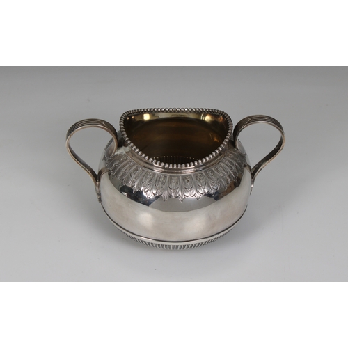 542 - A silver sugar basin Martin, Hall & Co, Sheffield, 1894, of bellied twin handle form with reeded det... 