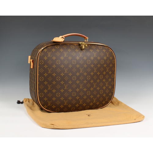 652 - A Louis Vuitton monogrammed travel case having monogrammed printed canvas, front zip pocket, full zi... 