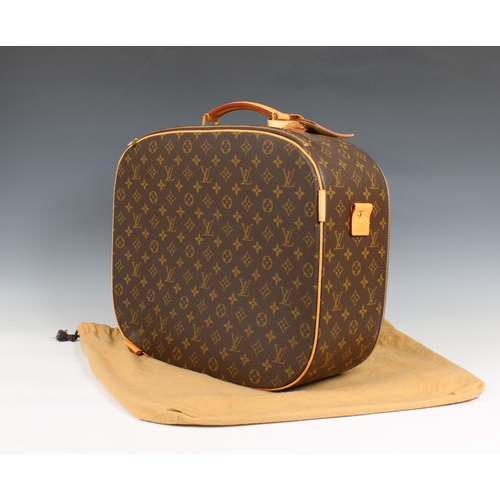 652 - A Louis Vuitton monogrammed travel case having monogrammed printed canvas, front zip pocket, full zi... 