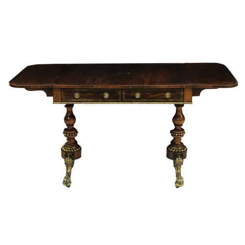 747 - A fine early 19th century rosewood veneer and brass marquetry sofa table in the manner of George Bul... 