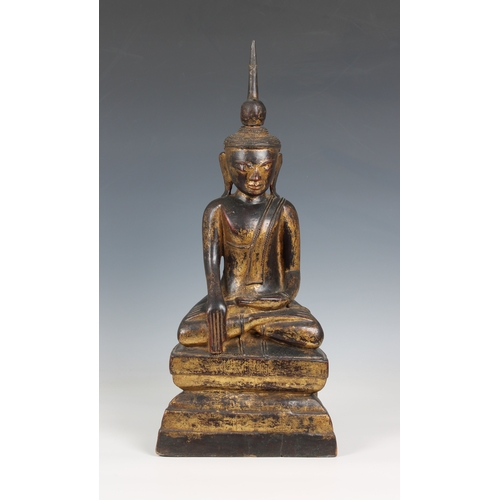 1122a - A Thai lacquered & gilded figure of Buddha Shakyamuni probably 19th century, 20¾in. (52.8cm.) high.