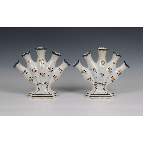 373 - A pair of Continental faience five stem vases 7½in. (19cm.) high.