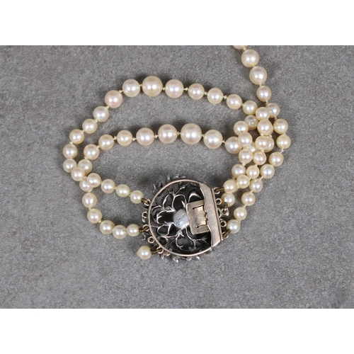 158a - A late 19th century three-row cultured pearl bracelet, having graduated 4.6 - 7.6mm pearls, with a 3... 