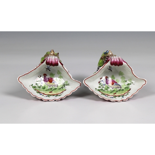 386 - A pair of Bow porcelain sweetmeat stands circa 1765 in the form of upturned scallop shells nestled o... 