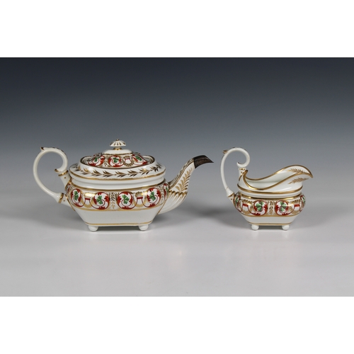 409 - A Derby porcelain tea pot and milk jug circa 1820, the tea pot with a silver spout factory mark bene... 