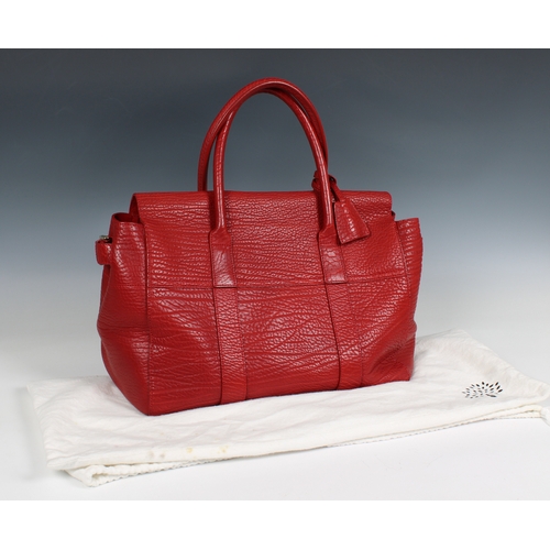 643 - Mulberry - A red Bayswater handbag crafted from red leather, featuring double rolled handles, top fl... 