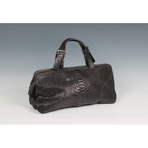 648 - A Hugo boss black baguette bag with front zipped pouch opening to reveal a satin lined twin section ... 