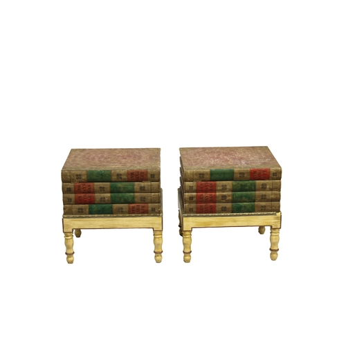 666 - A pair of late 20th century side tables in the form of four stacked books each on painted stands wit... 