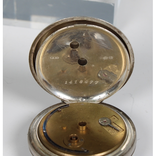 331 - A silver 'Symon's and Sons Launceston' pocket watch 1 7/8 (5.7cm.) diameter, with key, contained in ... 