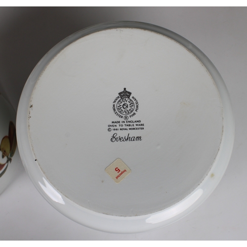 102 - A collection of Royal Worcester Evesham pattern dinner ware to include a pair of biscuit barrels wit... 