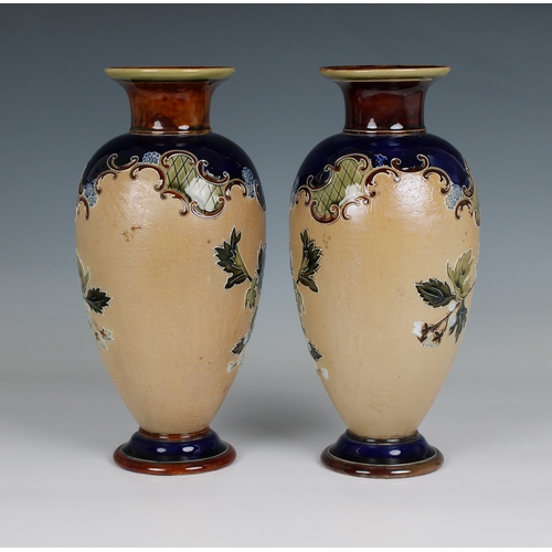 109 - A matched pair of Doulton Lambeth Slater's Patent vases of baluster form typically decorated with fl... 