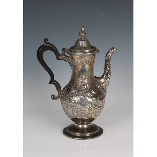 154 - A George III silver coffee pot John Scofield, London, 1774, the hinged cover with bud finial and bea... 