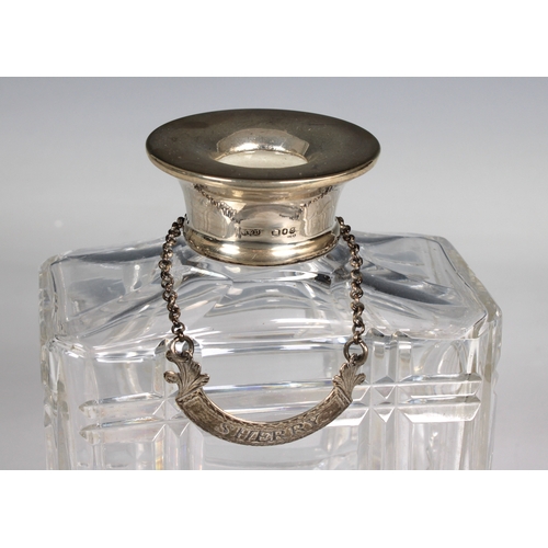 165 - A silver mounted rectangular clear glass decanter and Georgian silver bottle ticket 9¾in. (24.8cm.) ... 