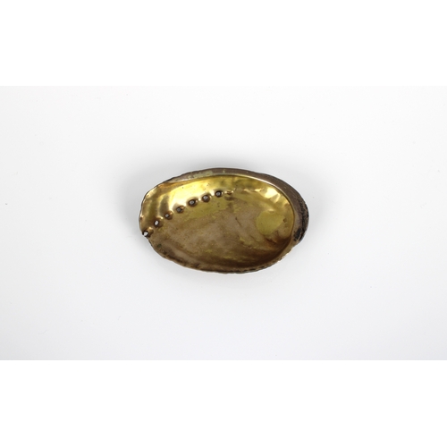 174 - A realistic silver and gilt ormer / abalone shell stamped 'AG' SILVER 925, 4in. (10cm.) long, weight... 