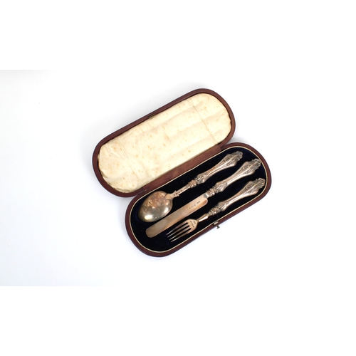 201 - A Victorian cased silver christening set Hilliard & Thomason, Birmingham, 1865, comprising a spoon, ... 