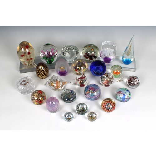 22 - A large collection of glass paperweights various sizes and shapes, unmarked, together with three res... 