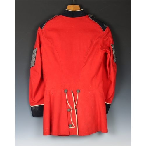 221 - A Guernsey Militia scarlet tunic possibly Sergeant Major, West regiment, eight silvered buttons to f... 