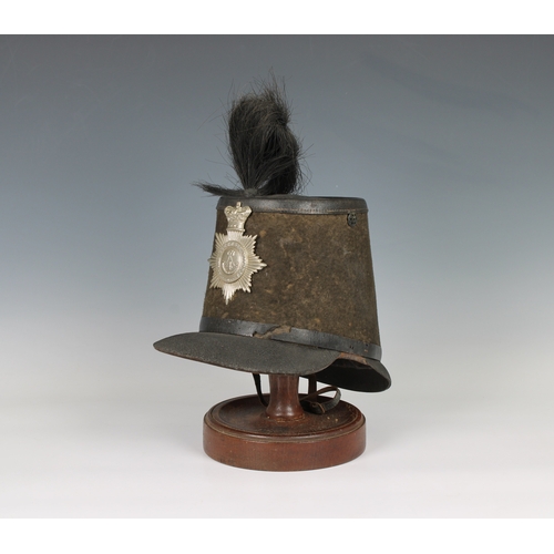 224 - An extremely rare 4th (West) Royal Guernsey Militia shako black cloth sides, leather top, black peak... 