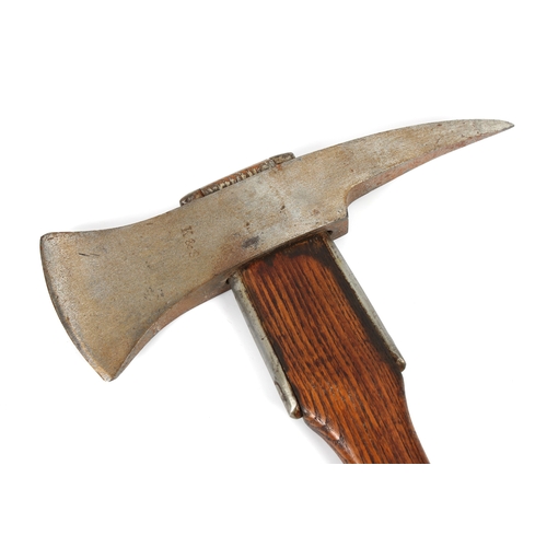 255 - An antique Fireman's hatchet / axe stamped 'K&S', overall length 15¾in. (40cm.)