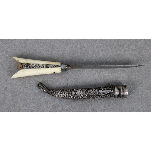 259 - A small Turkish Bichaq type knife 10.8cm. single edged blade, later engraved with foliate design and... 