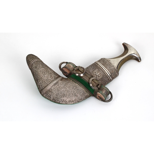 261 - An early 20th century Omani Khanjar dagger bearing the arms of the Sultanate of Oman steel blade, wa... 