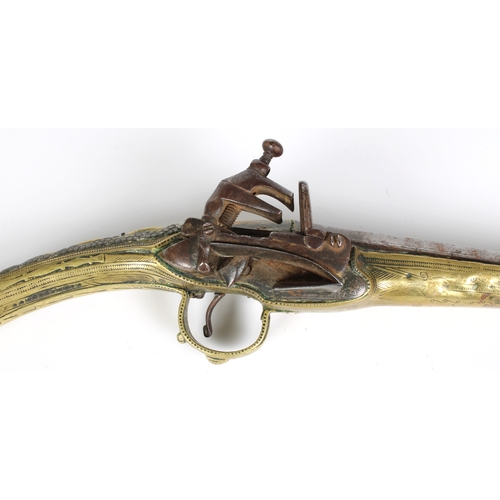 292 - A late 18th or early 19th century Balkan Miquelet flintlock pistol, the full stock, rat tail butt an... 