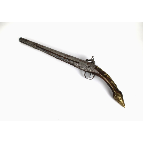 293 - A late 18th or early 19th century Balkan Miquelet flintlock pistol, the rat tail butt in sheet brass... 