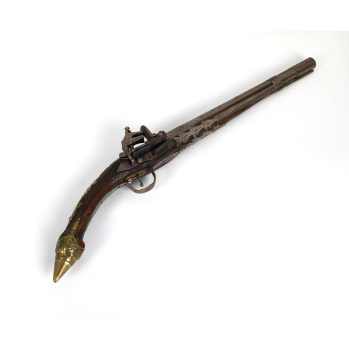 293 - A late 18th or early 19th century Balkan Miquelet flintlock pistol, the rat tail butt in sheet brass... 