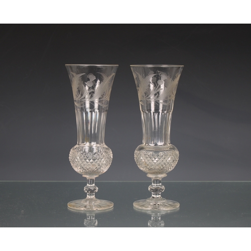 33 - Pair of clear cut glass thistle glasses etched with thistle decoration 8½in. (22.9cm.) high. (2)