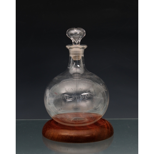 35 - A late Victorian Max Greger & Co clear glass onion shaped decanter and stopper with acid etched insc... 