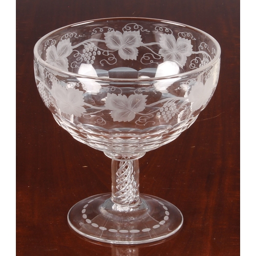 44 - A large 19th century glass pedestal footed bowl with air-twist stem, the bowl with a deep band of et... 