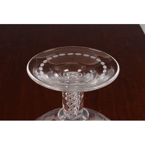 44 - A large 19th century glass pedestal footed bowl with air-twist stem, the bowl with a deep band of et... 