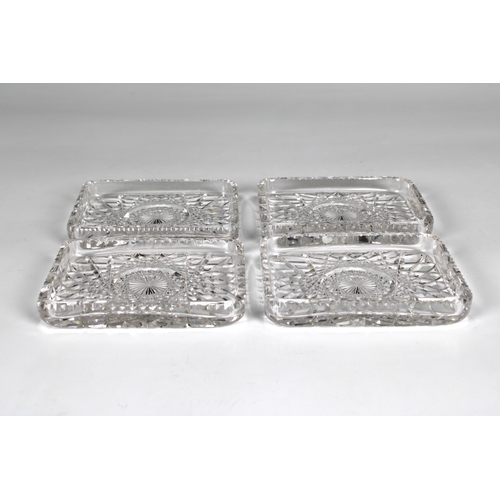 46 - A cased set of four rectangular cut glass butter dishes late 19th century, 3¾ x 2 7/8in. (9.7 x 7.4c... 