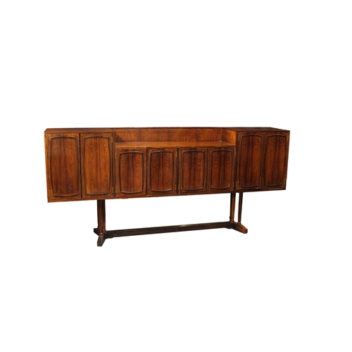 498 - A 20th century hand made rosewood sideboard with four book matched small cupboard doors to the centr... 