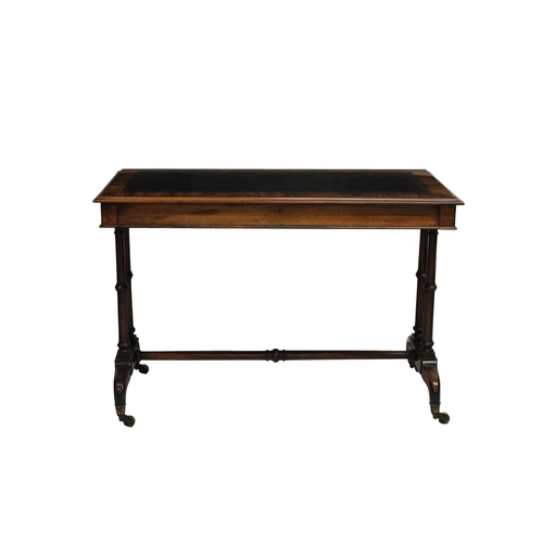 502 - A Victorian leather inset mahogany writing table the rectangular top over a full width frieze drawer... 