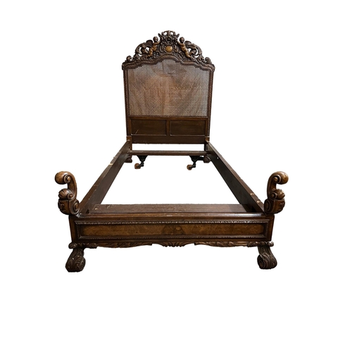 508 - A pair of 1930's 'VONO' decorative carved walnut single bed frames the carving in 17th century style... 