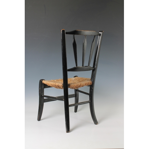 524 - A Victorian ebonised child's chair.