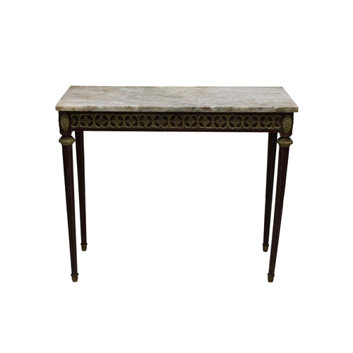 559 - A late 19th century marble top console table with a pale variegated marble top above an ornate freez... 