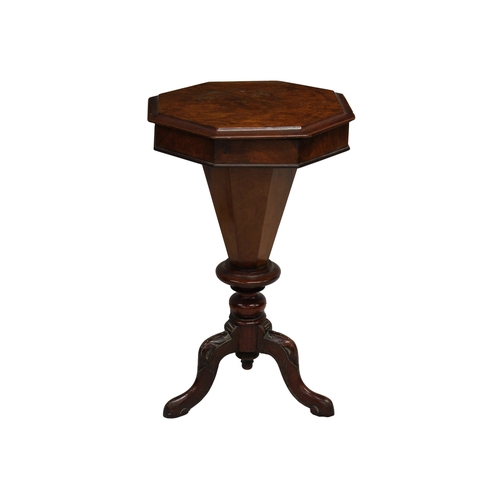 561 - A Victorian walnut sewing table of trumpet form, the thumb moulded octagonal lid opening to eight sh... 