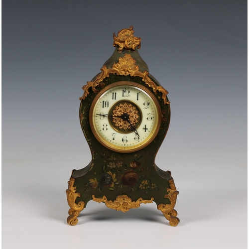 583 - A painted wood and gilt metal French mantel clock 10¾in. (27.4cm.) high.