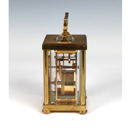 586 - A Matthew Norman carriage clock 20th Century, with visible escapement, white dial with Roman numeral... 