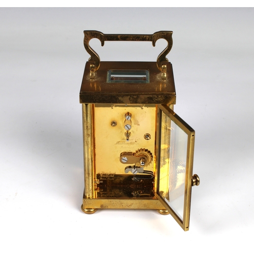 586 - A Matthew Norman carriage clock 20th Century, with visible escapement, white dial with Roman numeral... 