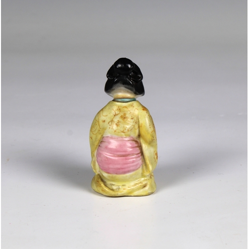 61 - A Royal Worcester figural candle snuffer fashioned as a Japanese Geisha girl, puce mark, 2¾in. (7cm.... 