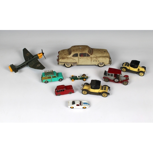 618 - A collection of vintage toys to include a Schuco, Ingenico 5301, US Z. Germany, together with variou... 